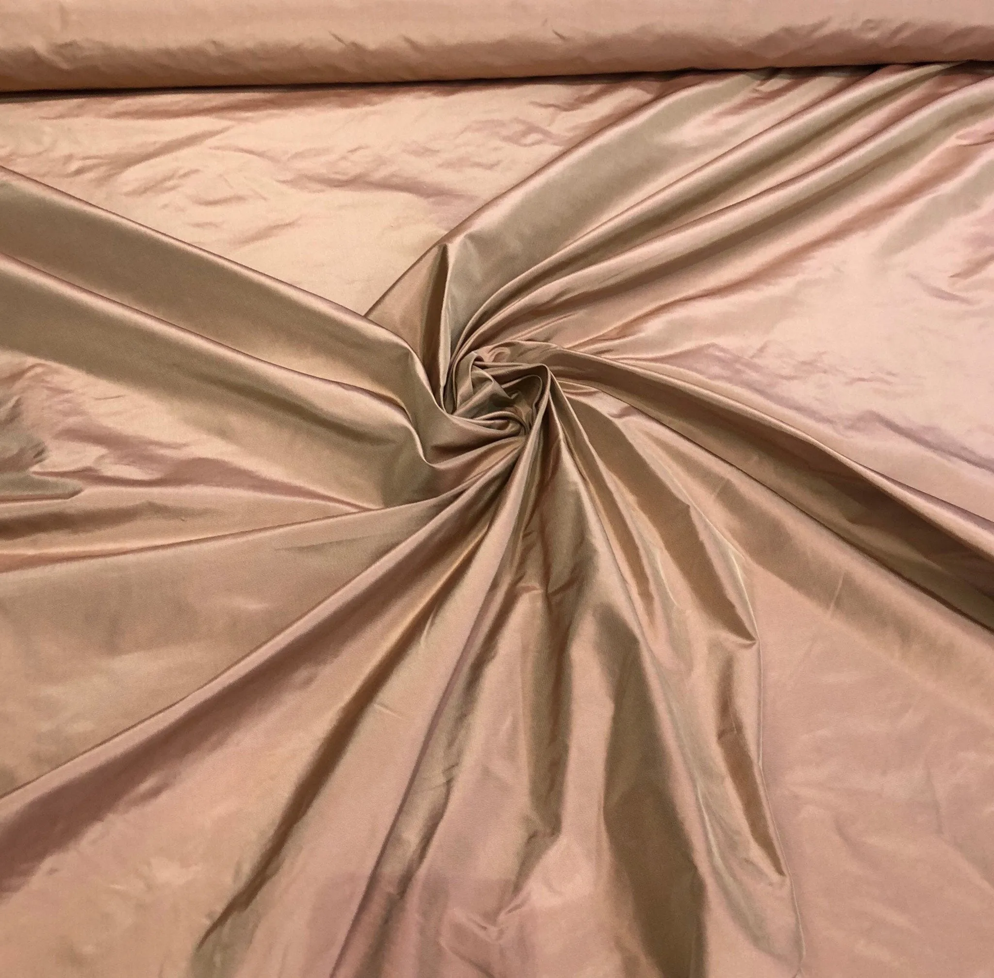 Silk taffeta 54&quot; wide    Beautiful light pumpkin gold color silk taffeta, you can also call it rose gold fabric sold by the yard