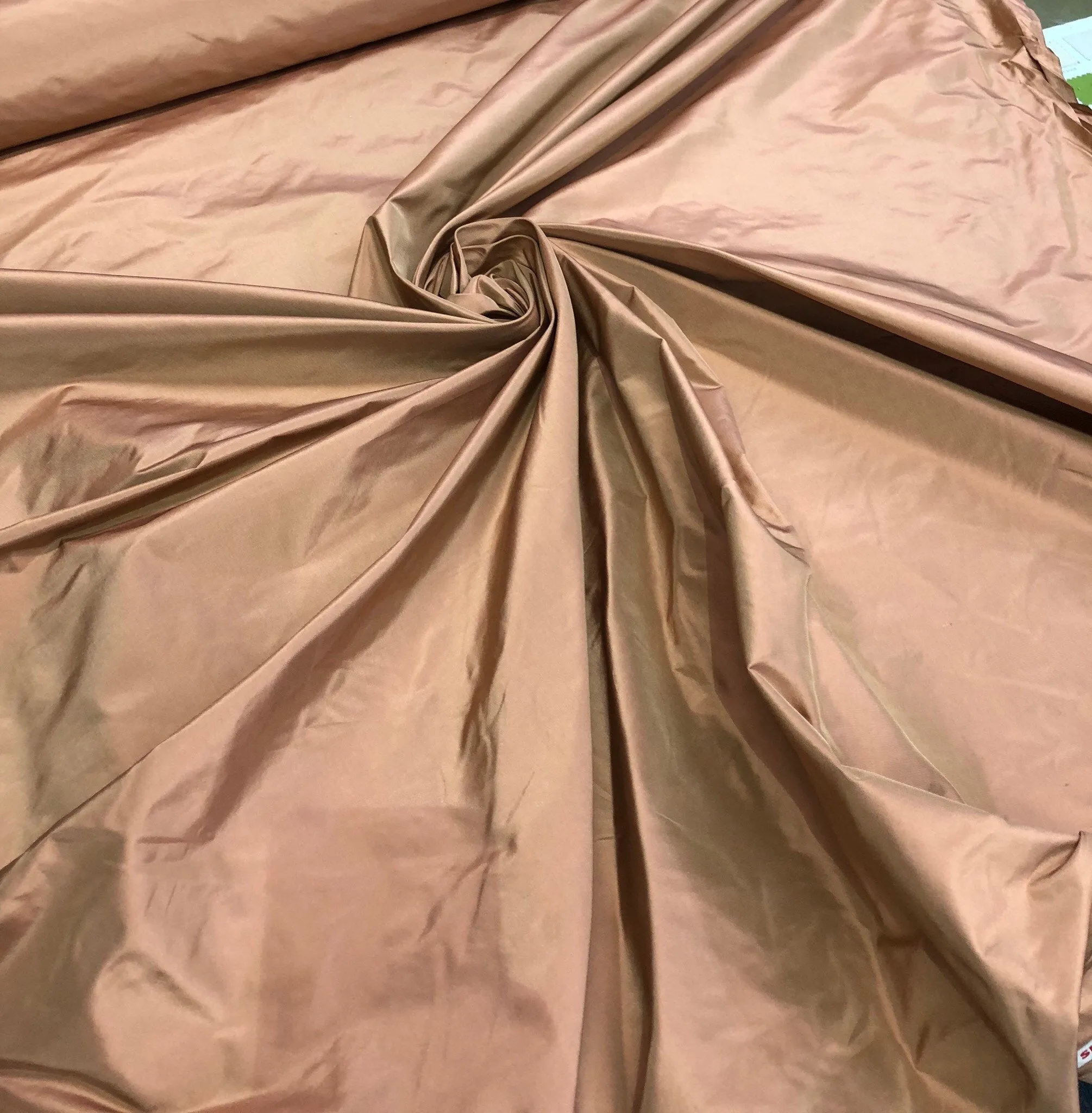 Silk taffeta 54&quot; wide    Beautiful light pumpkin gold color silk taffeta, you can also call it rose gold fabric sold by the yard