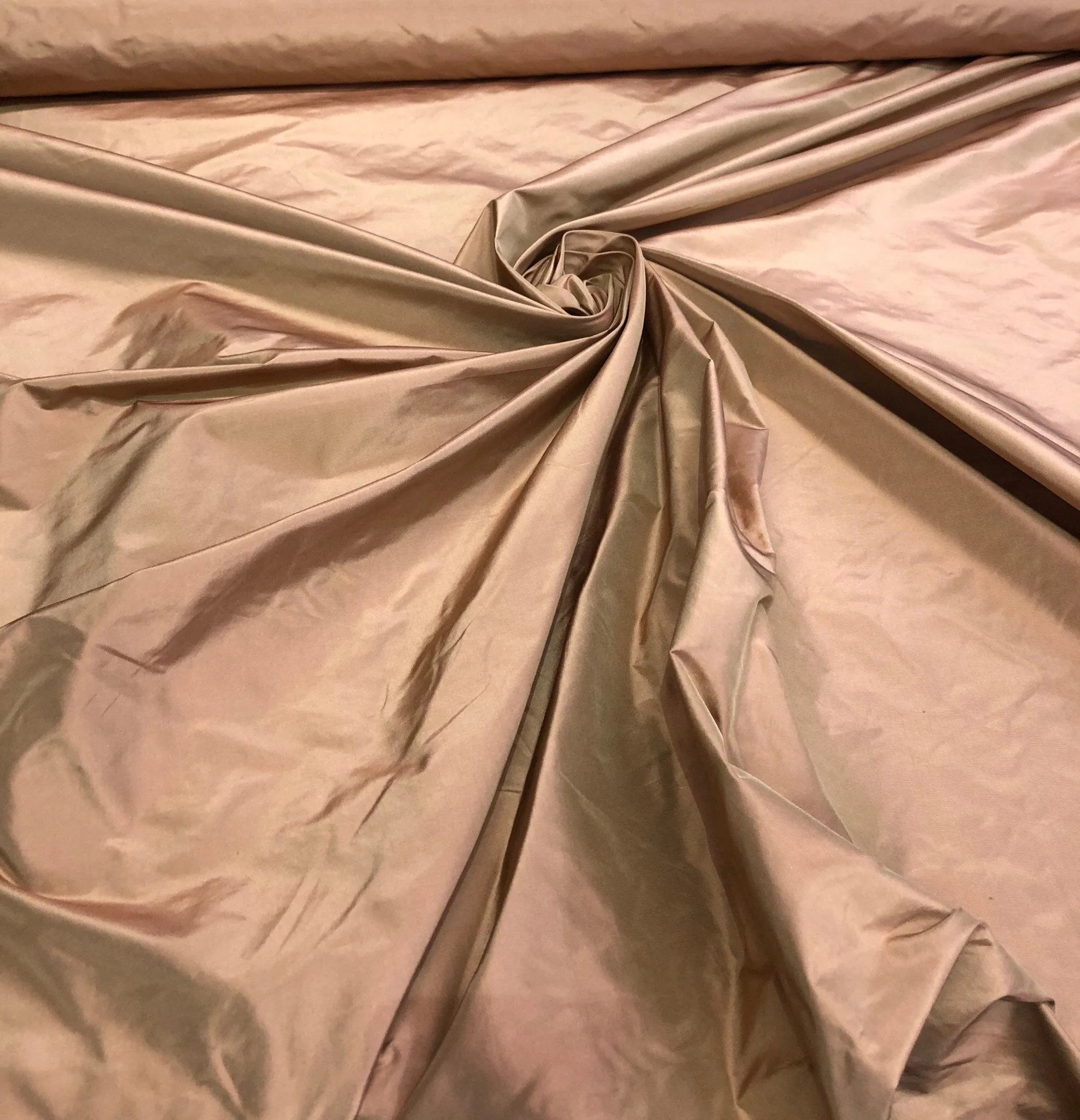 Silk taffeta 54&quot; wide    Beautiful light pumpkin gold color silk taffeta, you can also call it rose gold fabric sold by the yard